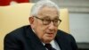 FILE - Former U.S. Secretary of State Henry Kissinger speaks during a meeting with then-President Donald Trump in the Oval Office of the White House, Oct. 10, 2017, in Washington. Kissinger died Nov. 29, 2023, at his Connecticut home. He was 100.