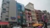 En este edificio de seis plantas en el barrio chino de la ciudad de Nueva York se cree que operaba la estacion de policía de China.
