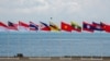 东盟成员国旗帜在印尼巴淡岛举行2023年东盟团结演习的海军基地上飘扬。（2023年9月20日）