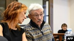 Oleg Orlov, the co-chair of the Nobel Prize winning Russia's human rights organization Memorial, appears in court in Moscow on Dec. 14, 2023. 