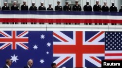 资料照片：美国、英国和澳大利亚领导人2023年3月13日宣布推进“澳英美安全协议”核潜艇方案。（路透社照片）