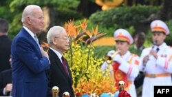 美国总统拜登9月10 到达越南，月共总书记阮富仲（Nguyen Phu Trong）在河内的越南总统府为拜登总统来访举行欢迎仪式。(Photo by SAUL LOEB / AFP)(SAUL LOEB / AFP)