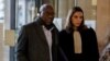Sosthene Munyemana arrive avec son avocate au Palais de justice de Paris, le 14 novembre 2023.