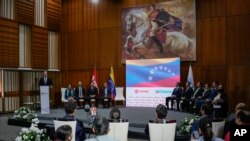 El ministro de Petróleo de Venezuela, Tareck El Aissami, habla durante una ceremonia de firma con Chevron, con sede en California, en Caracas, Venezuela, el 2 de diciembre de 2022.
