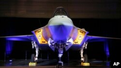 美国空军2014年3月接收F-35A仪式（美联社）