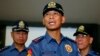 Philippine National Police Director General Ricardo Marquez reads the joint statement of the military and police on the beheading of Canadian hostage John Ridsdel of Calgary, Alberta by Muslim extremist Abu Sayyaf group in southern Philippines Tuesday, April 26, 2016 at Camp Crame in suburban Quezon city, northeast of Manila, Philippines.