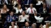 Los legisladores celebran después de que un proyecto de ley promovido por el presidente argentino Javier Milei fuera aprobado en general por la cámara baja del Congreso, en Buenos Aires, Argentina, el viernes 2 de febrero de 2024.