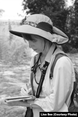 Author Lisa See conducts an interview in the mountains of China. See's latest novel is "The Tea Girl of Hummingbird Lane."