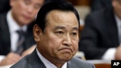 FILE - South Korea's Prime Minister Lee Wan Koo at the National Assembly in Seoul, South Korea, Feb. 10, 2015.
