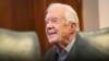 FILE - Former President Jimmy Carter, 93, sits for an interview about his latest book, April 11, 2018, in Atlanta.