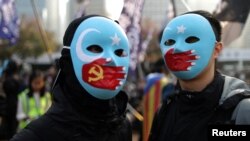 香港抗议者举行集会支持新疆维吾尔穆斯林的人权。（2019年12月22日）