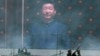 习近平的巨幅照片出现在北京纪念中国人民抗日战争暨世界反法西斯战争胜利70周年大会上