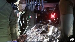 ARCHIVO - En los últimos días han sido localizados más de 600 migrantes en camiones que habían sido abandonados en las carreteras del sur del Golfo de México.