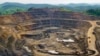 File - Excavators and drillers at work in an open pit at Tenke Fungurume, a copper and cobalt mine 110 kilometers northwest of Lubumbashi in Congo's copper-producing south, owned by miner Freeport McMoRan, Lundin Mining and state mining company Gecamines.