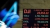 Archivo-El Promedio Industrial Dow Jones después de cerrar el 11 de marzo de 2020, cuando la econom☺a estadounidense se removió por la crisis global de coronavirus.