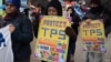 Inmigrantes participan en la Marcha por la Justicia del TPS mientras se manifiestan frente a la Casa Blanca en Washington, DC, el 12 de febrero de 2019.