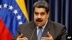 El presidente de Venezuela Nicolás Maduro habla durante una conferencia de prensa en el Palacio de Miraflores en Caracas, Venezuela, el 18 de septiembre del 2018.