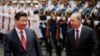 2014年5月习近平主席和普京总统在上海西郊国宾馆的欢迎仪式上阅兵。中俄有联合有竞争