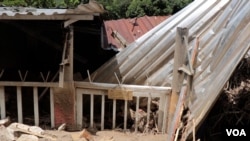 De esta Iglesia Evangélica solo queda en pie un letrero, Las Tejerías, Venezuela.
