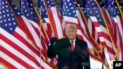 President Donald Trump arrives to speak at a rally Jan. 6, 2021, in Washington. 