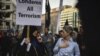FILE - American Shi'ite Muslims march to the White House to protest against the Islamic State group, in Washington, D.C., Dec. 6, 2015. 