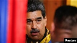 El presidente venezolano Nicolás Maduro llega al acto oficial de inauguración del año judicial en la sede del Tribunal Supremo de Justicia, en Caracas, el 31 de enero de 2024.