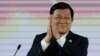Vietnam's President Truong Tan Sang applauds during the Asia-Pacific Economic Cooperation (APEC) CEO summit in Manila, Philippines, Nov. 17, 2015. Presidents of the Philippines and Vietnam are showing a more united front on the disputed South China Sea issue on the sidelines of the summit.
