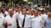 Las protestas comenzaron en la sede del legislativo en Caracas, donde Juan Guaidó, centro, dio un discurso antes de que los diputados celebraran una sesión especial para conmemorar el día de la independencia de Venezuela.