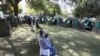 FILE: Bamelele ukuhlolwa igciwane leHIV eHarare, Zimbabwe, June, 22, 2012.