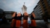 Nuns gather near a makeshift memorial outside Gemelli Hospital in Rome, where Pope Francis is being treated for double pneumonia, March 8, 2025. 