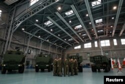 ภาพการส่งมอบอาวุธ HIMARS (High Mobility Artillery Rocket System) ให้แก่กองทัพโปแลนด์ในกรุงวอร์ซอ เมื่อวันที่ 15 พ.ค. 2023