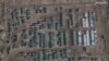 This handout satellite image released by Maxar Technologies and taken on November 1, 2021, shows the presence of a large ground forces deployment on the northern edge of the town of Yelnya, Smolensk Oblast, Russia. 