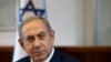 Una columna de humo se eleva durante el bombardeo israelí en Khan Yunis, visto desde Rafah en el sur de la Franja de Gaza el 29 de marzo de 2024, en medio de batallas en curso entre Israel y el grupo militante palestino Hamás.