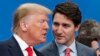 ARCHIVO - El presidente de Estados Unidos, Donald Trump, izquierda, y el primer ministro canadiense, Justin Trudeau, conversan antes de una mesa redonda de la OTAN en el hotel y resort The Grove en Watford, Hertfordshire, Inglaterra, el 4 de diciembre de 2019. AP