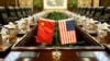 美国农业部长桑尼·珀杜和中国农业部长韩长赋2017年6月30日在中国农业部开会前的会议室(路透社资料照)