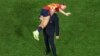 This picture taken on August 20, 2023 shows President of the Royal Spanish Football Federation Luis Rubiales carrying Spain's Athenea del Castillo Beivide on his shoulder as they celebrate winning the Australia and New Zealand 2023 Women's World Cup final