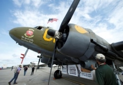 A Douglas C-47, called "Rosinenbomber" (German for "raisin bomber") and used during the Berlin Airlift, stands on the tarmac to celebrate the 70th anniversary of the Berlin Airlift at the U.S. Army's airfield in Wiesbaden, Germany, June 10, 2019.