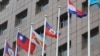 เสาที่สามจากขวาเคยติดธงชาติประเทศนาอูรู ณ ตึก Diplomatic Quarter ที่กรุงไทเป วันที่ 15 ม.ค. 2024