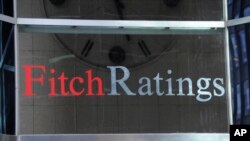Esta foto muestra 1 State Street Plaza, sede de Fitch Ratings, el domingo 9 de octubre de 2011 en Nueva York. (Foto AP/Henny Ray Abrams)