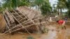 Residents begin cleaning up their homes in Cabanatuan, Philippines, October 20, 2015, two days after Typhoon Koppu battered northern Philippines and flooded Cabanatuan city and nearby provinces. 