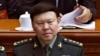 In this March 8, 2017, photo, Zhang Yang, left, the then-head of China's People's Liberation Army (PLA) political affairs department, and Fang Fenghui, right, the then-chief of the general staff of the Chinese People's Liberation Army, attend the China's 