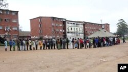 Voters captured in one of the polling stations in Zimbabwe's capital city, Harare. (AP)