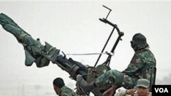 Las fuerzas rebeldes en Libia usan unidades antiaéreas móviles para hacer frente al poder de los aviones de Gadhafi.