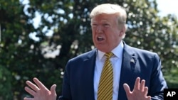 FILE - President Donald Trump speaks to reporters on the South Lawn of the White House in Washington, June 22, 2019.