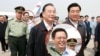 海南省委常委、副省长谭力过去任职四川时跟随胡锦涛、温家宝视察（网上资料照片）