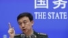 中国国防部发言人吴谦在北京中国国务院举行的记者会上（2019年7月24日）