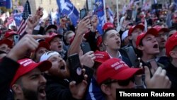 Ciudadanos participan en una manifestación en apoyo al presidente de Estados Unidos, Donald Trump, en Washington DC, el pasado 14 de septiembre.